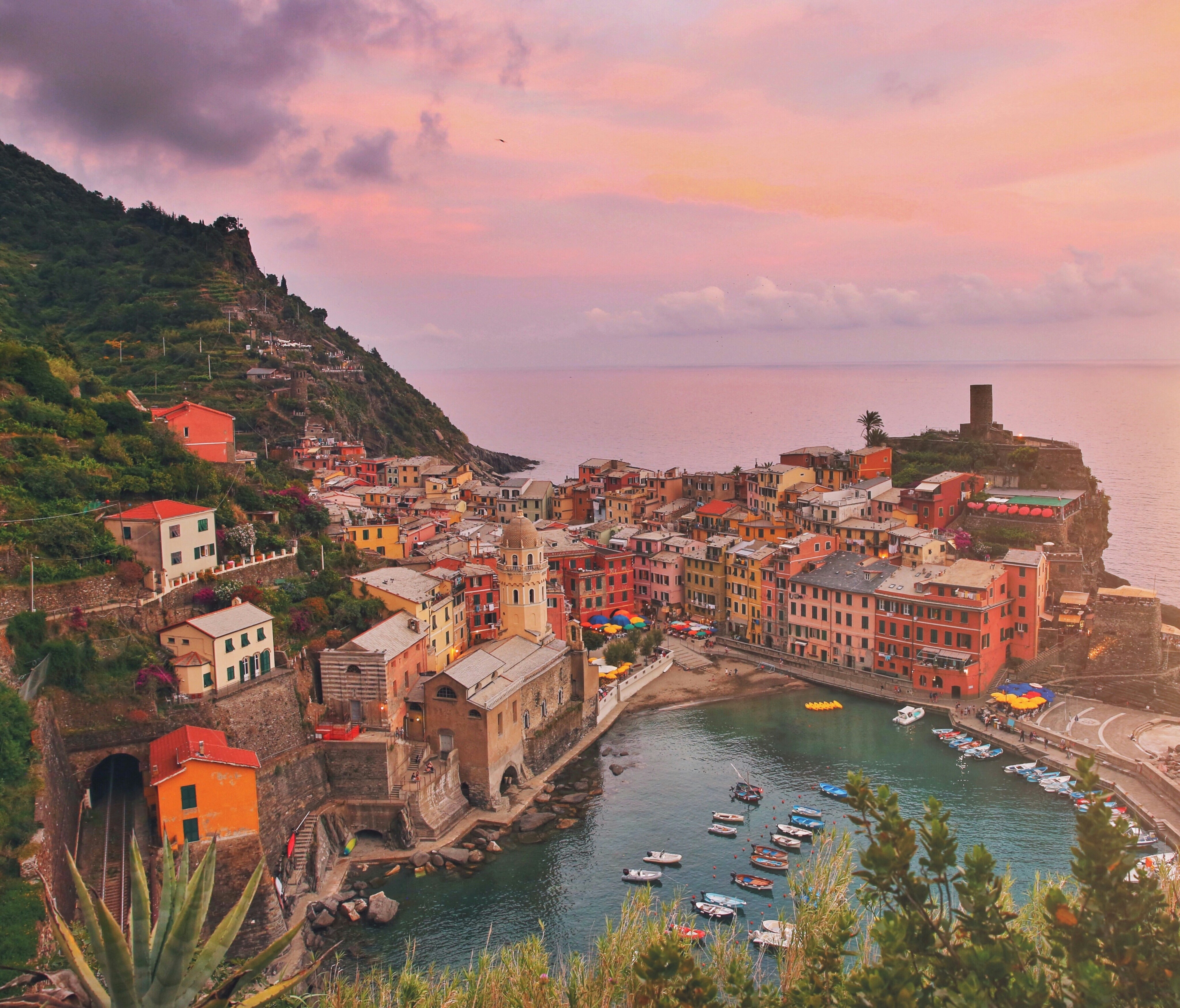 Colorful houses above a harbor on the Italian Riviera