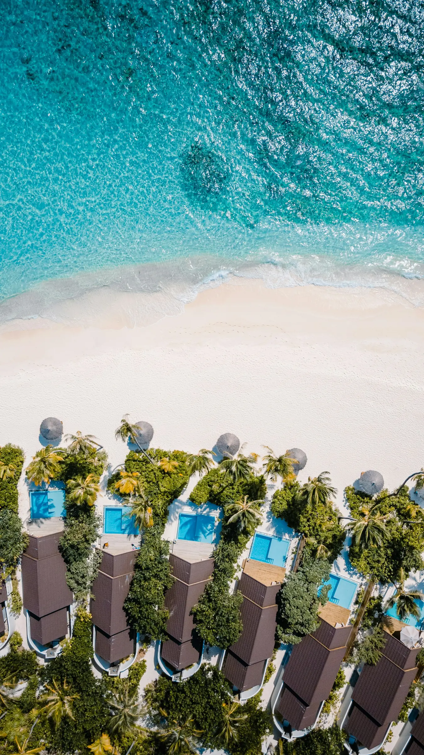 Aerial view of Maldives beach villas